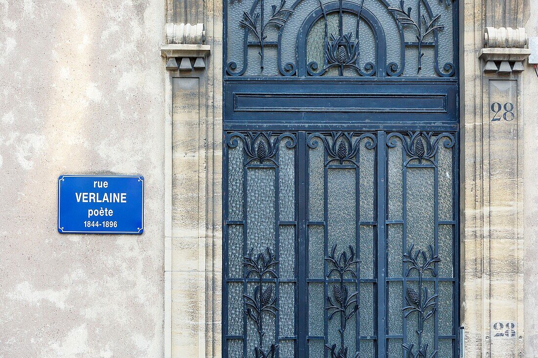 France, Meurthe et Moselle, Nancy, detail of a door and ironworks in Rue Verlaine (Verlaine street)\n