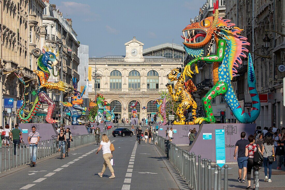 France, Nord, Lille, Lille 3000 Eldorado, Alebrijes (giant creatures in whimsical colors) along Faidherbe street overlooking the Lille Flandres train station\n