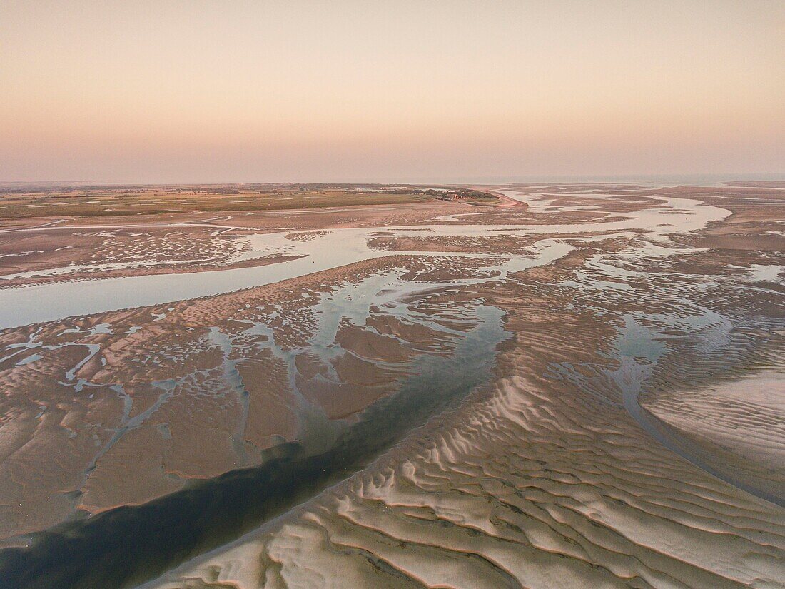 France, Somme, Somme Bay, Le Hourdel, the Hourdel point and the meanders of the channels between the sand banks in the bay at low tide (aerial view)\n