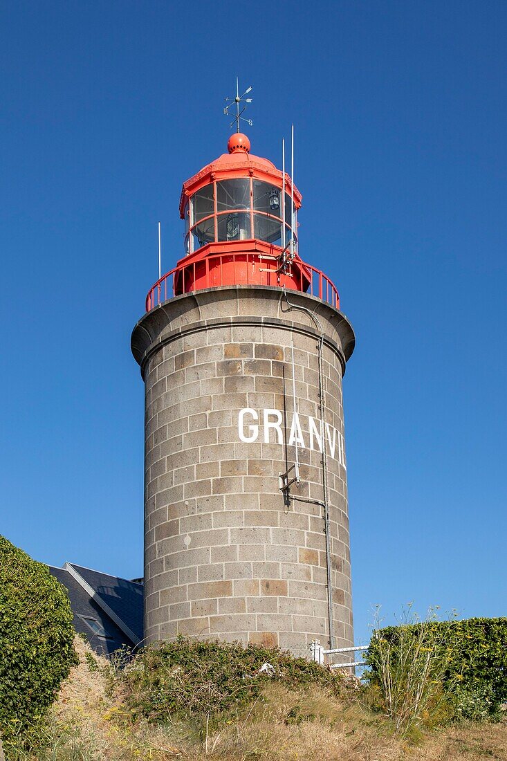 France, Manche, Cotentin, Granville, fortified town built on a rocky headland on the far eastern point of the Mont Saint Michel Bay, Granville lighthouse or Cap Lihoulighthouse at pointe du Roc\n