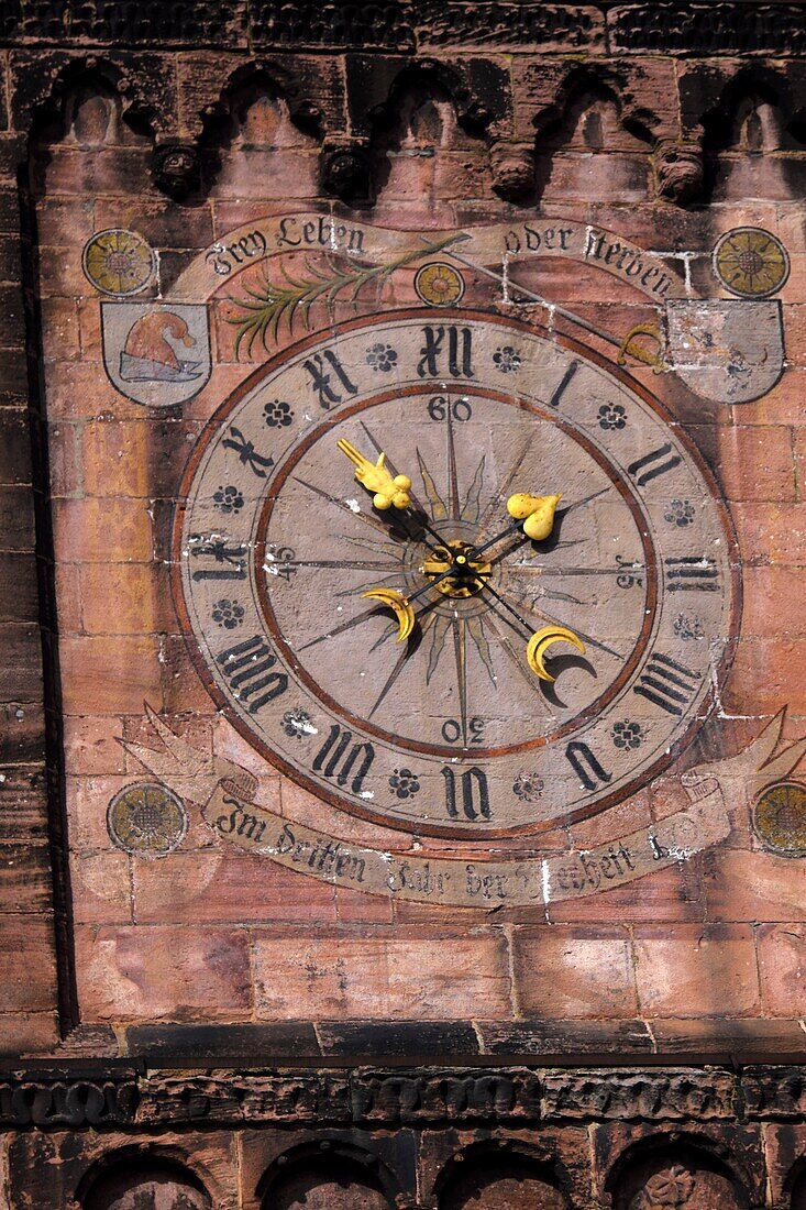 France, Haut Rhin, Guebwiller, Saint Leger church, Romanesque tower on the south side, clock dated 1787\n