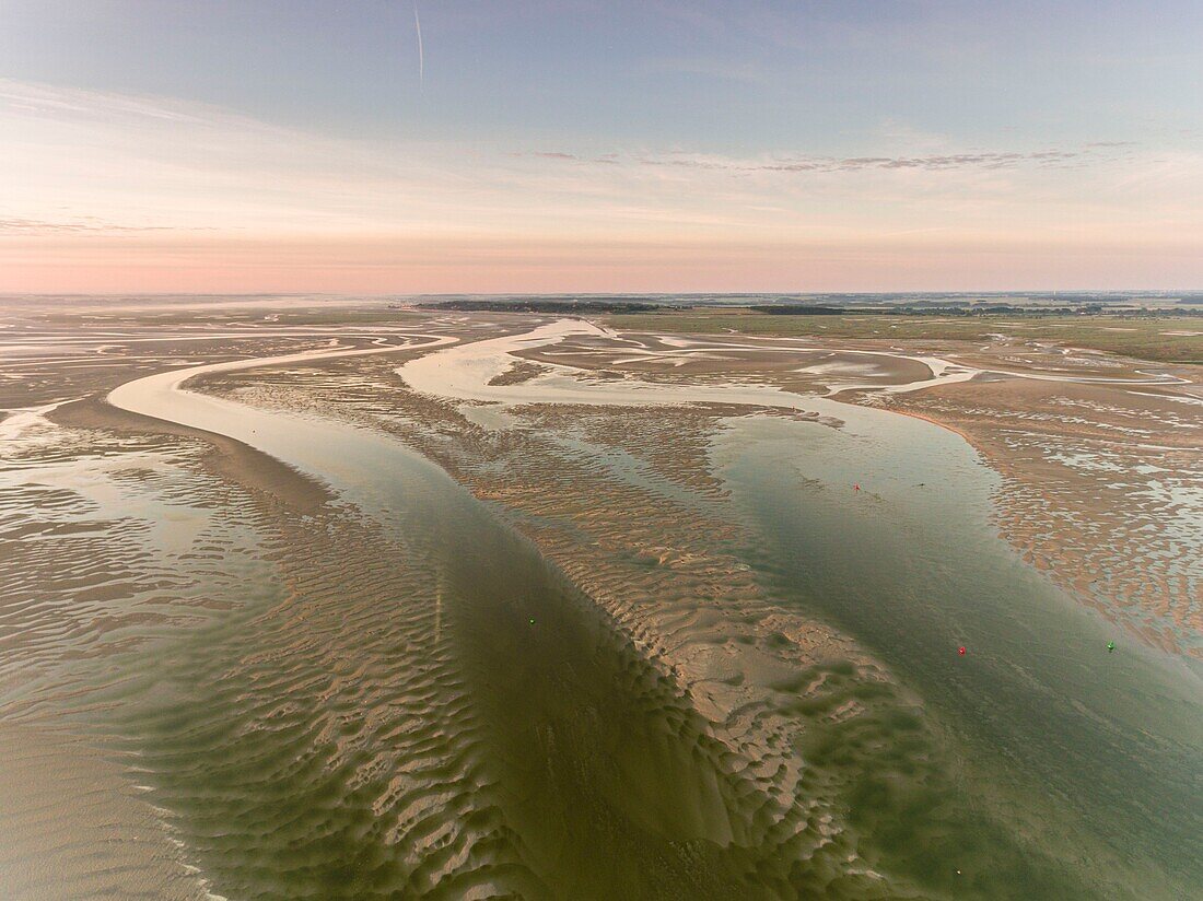 France, Somme, Baie de Somme, Le Hourdel, The tip of the Hourdel and the sand banks of the Baie de Somme at low tide (aerial view), the channel of the Somme extends to the sea\n
