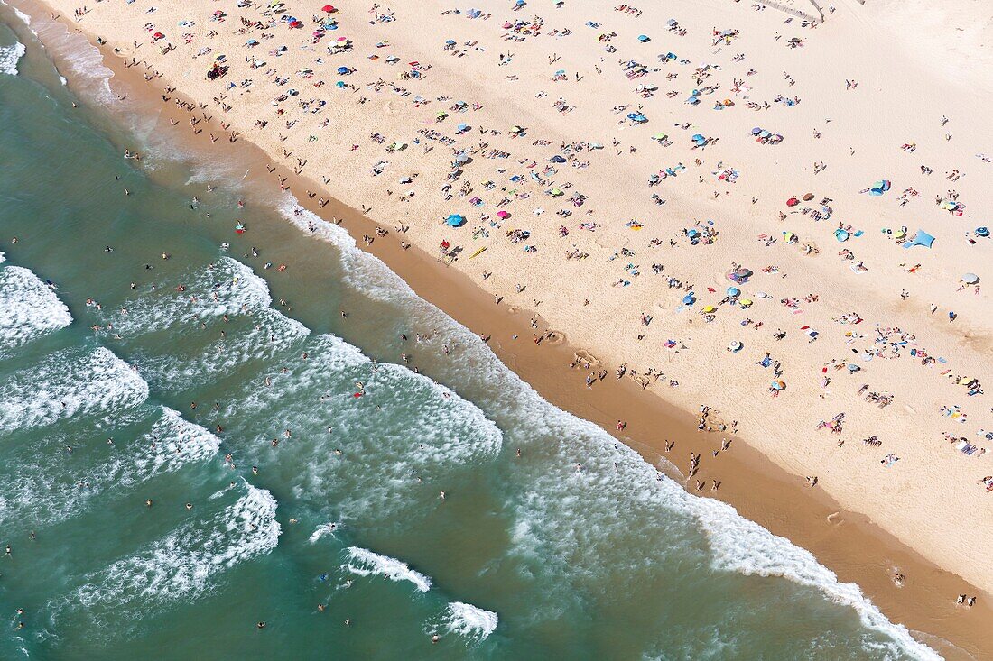 France, Gironde, Lacanau, Lacanau Océan, the beach in summer (aerial view)\n