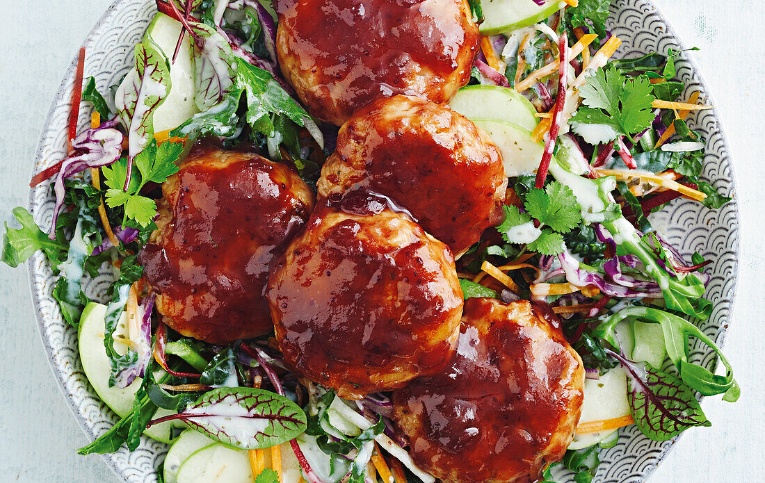 Turkey and bacon patties on salad