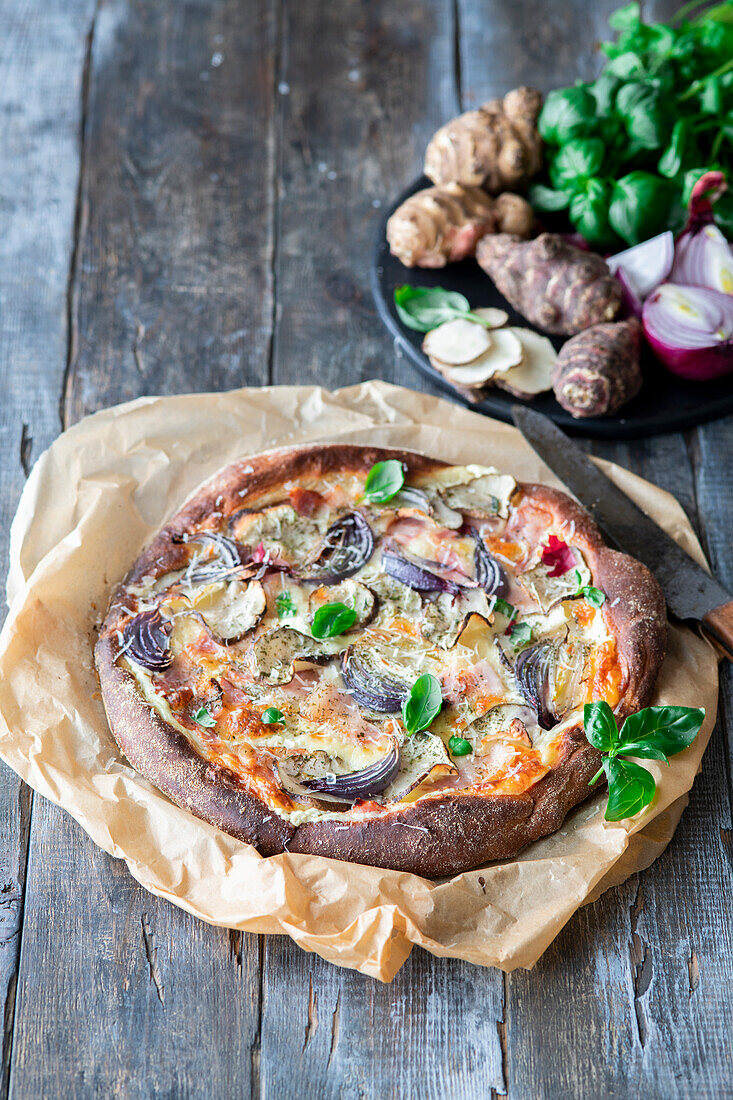 Jerusalem artichoke pizza bianca with bacon and onions