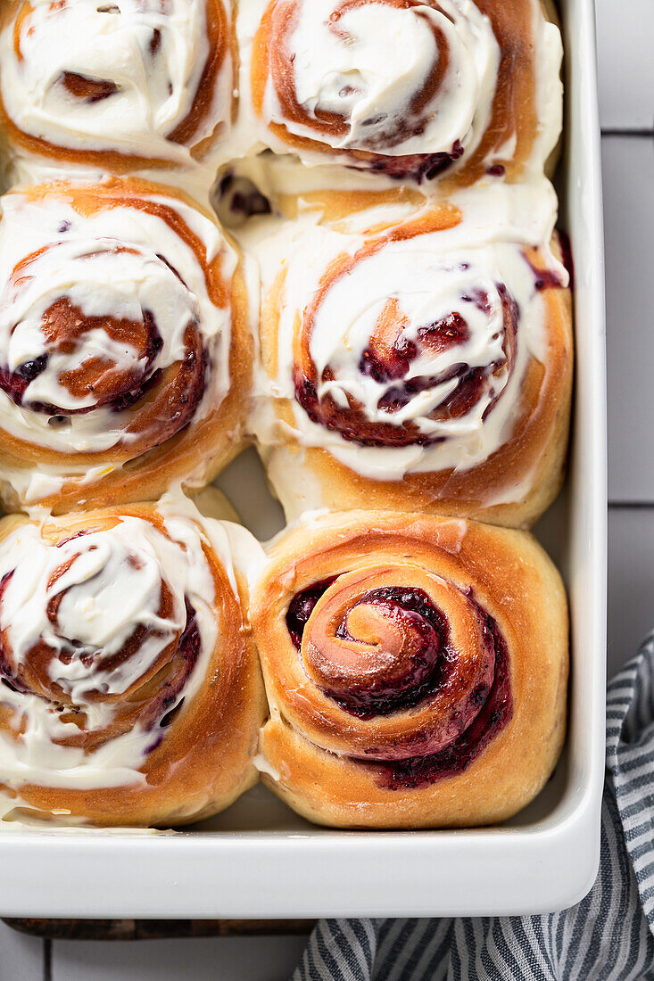 Blueberry buns made from yeast dough with icing
