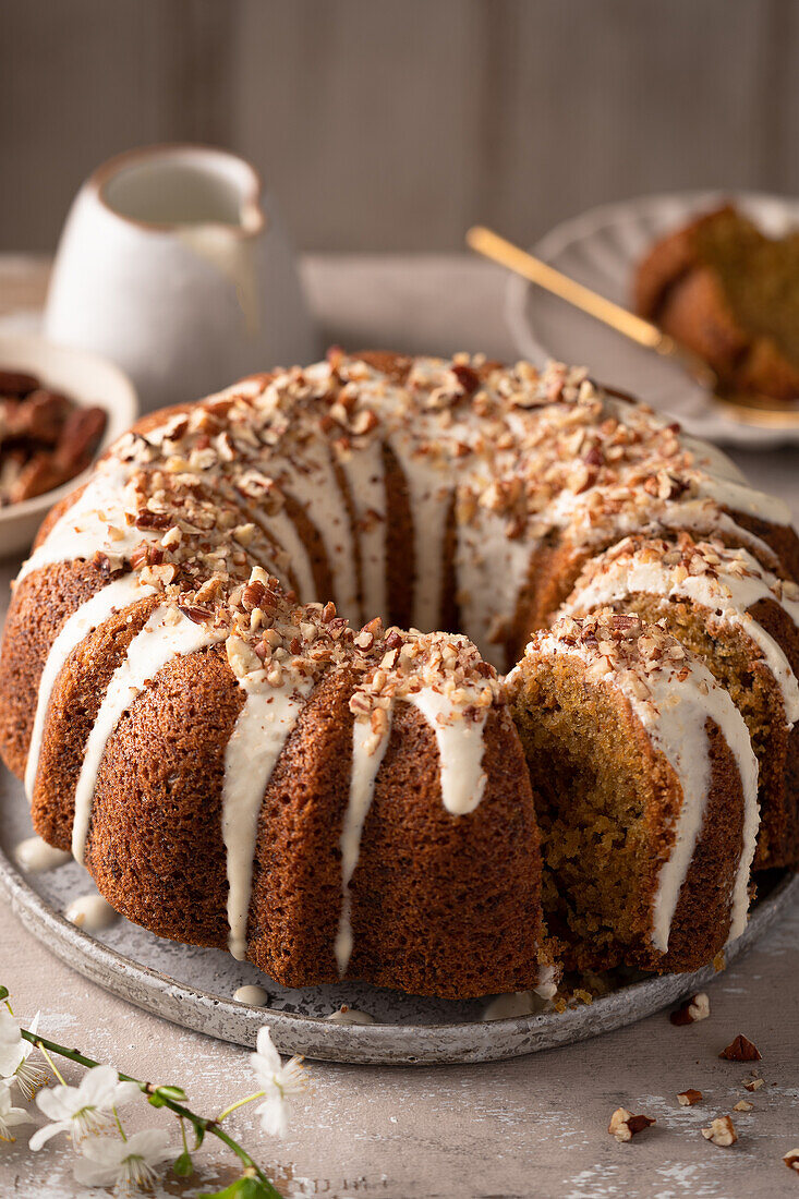 Carrot bundt cake with pecans and icing
