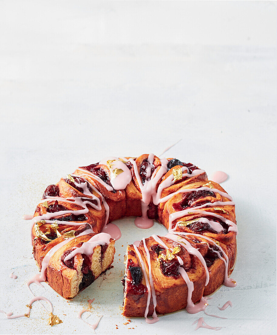 Cheat's cherry Christmas wreath cake