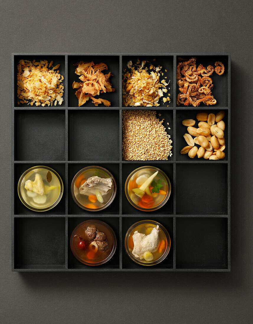 Tray with toppings and soups
