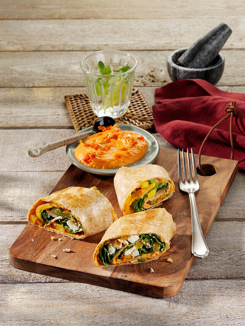 Pepper and spinach tortillas with roasted paprika hummus