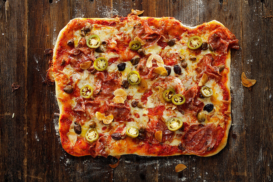 Pizza with fennel salami and jalapenos