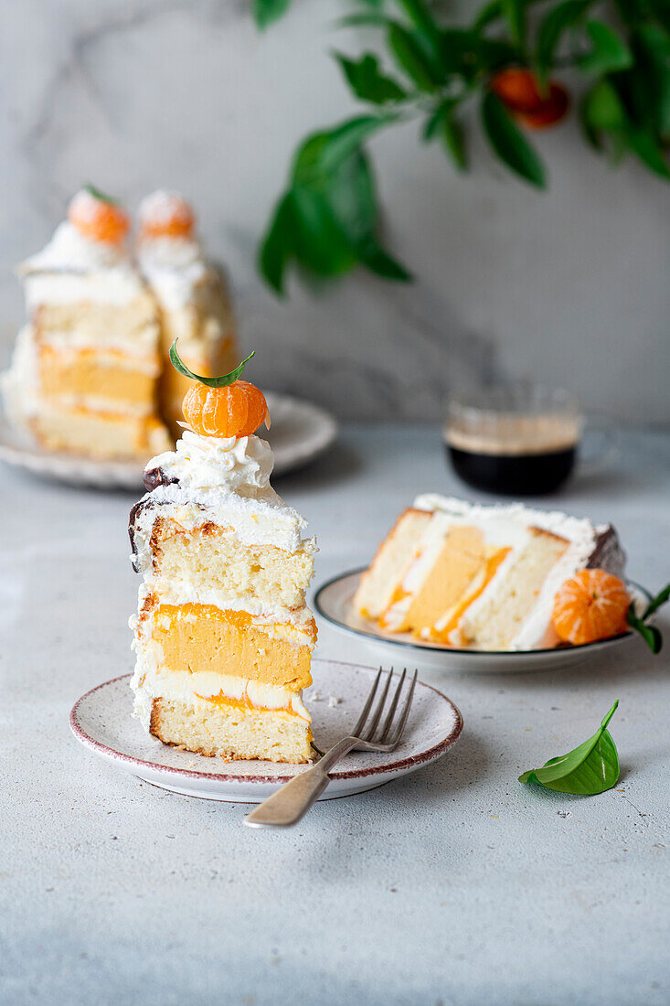 Clementine buttercream cake with baked cheesecake layer