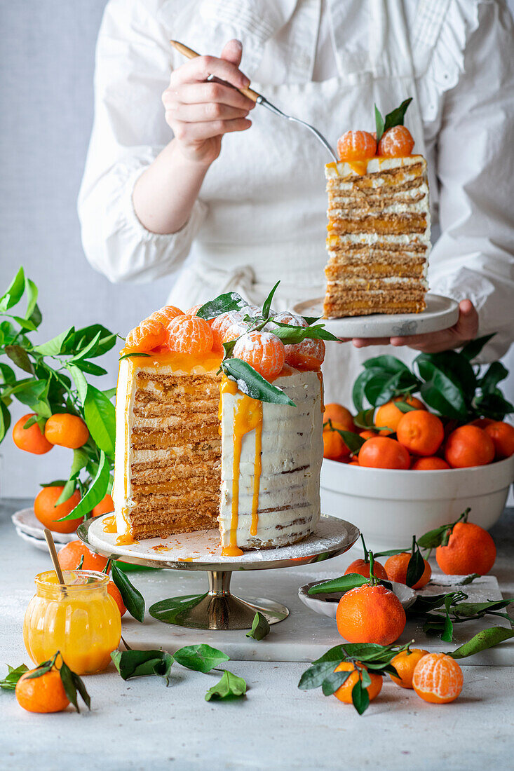 Clementine cake with sour cream, honey cake layers and clementine quark