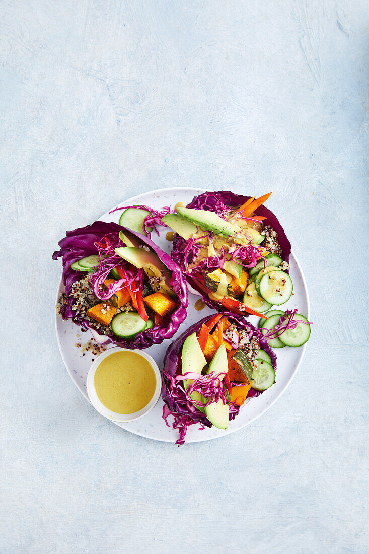 Red cabbage bowls with quinoa, pumpkin and avocado