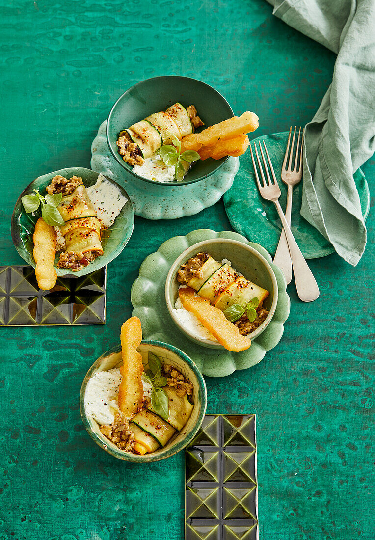 Zucchini rolls with ricotta cream and garlic croutons