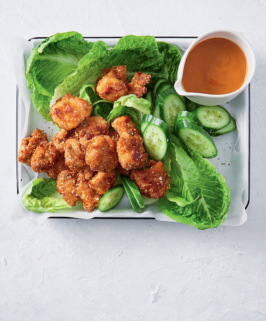 Popcorn chicken bites with katsu sauce