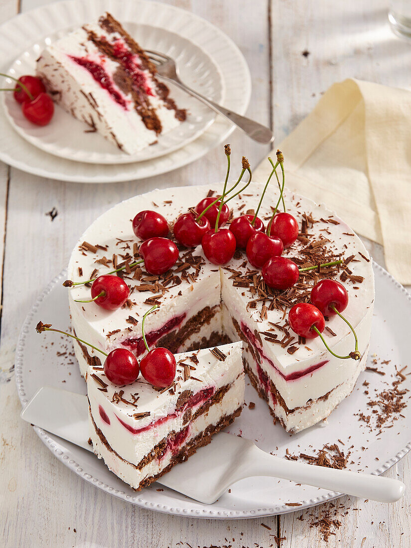 Cherry ice cream cake with chocolate shavings