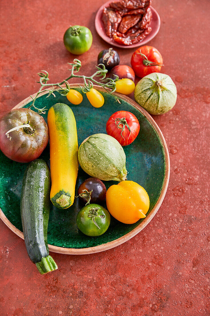 Various types of tomatoes and zucchini