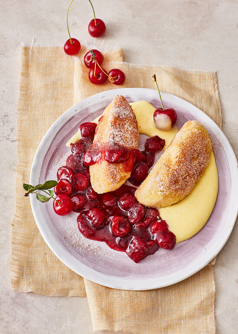 Carthusian dumplings with zabaglione and cherry compote