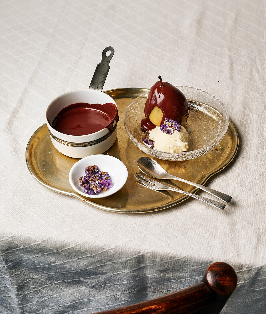 Pear Helene with chocolate sauce and vanilla ice cream