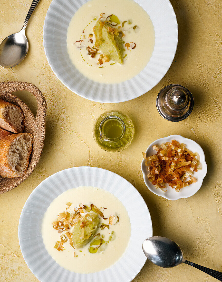 Crème vichyssoise with herb oil and leek