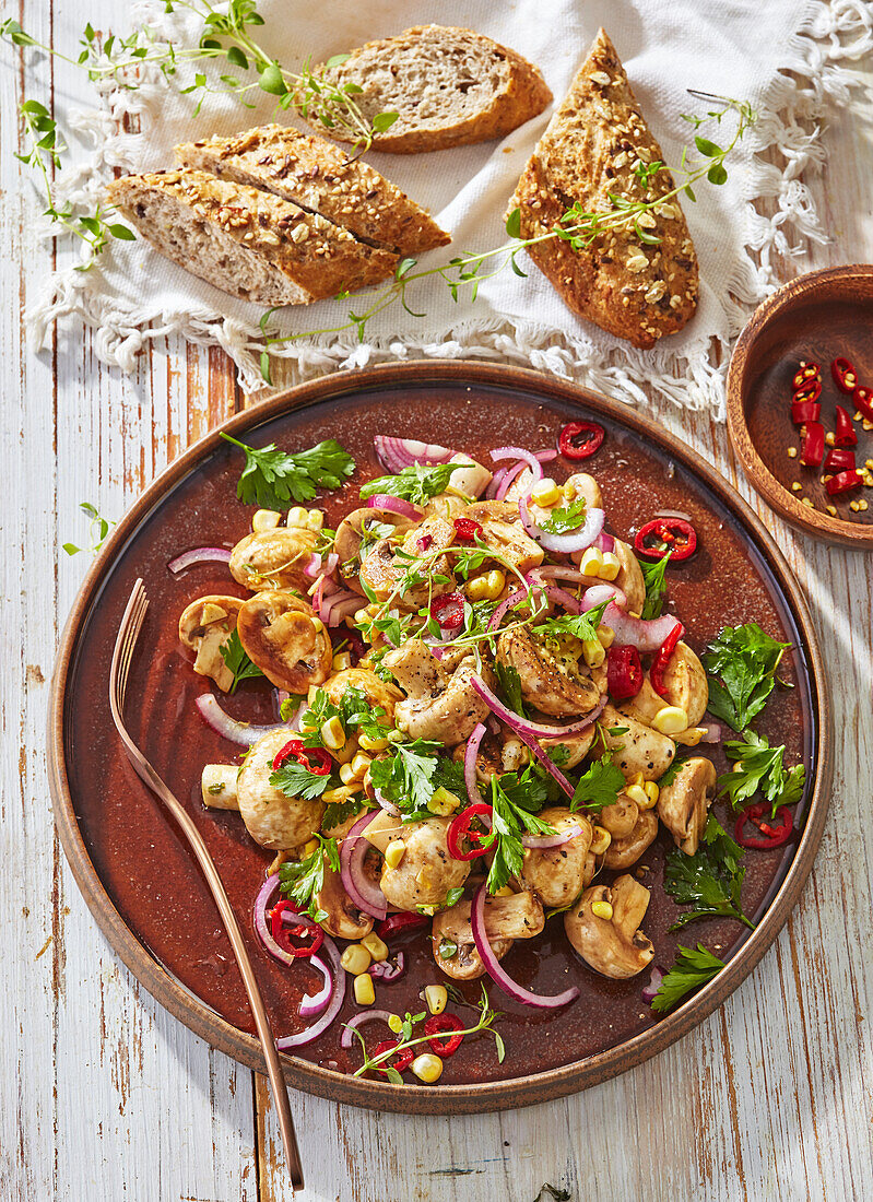 Marinated mushroom salad with chili and red onions