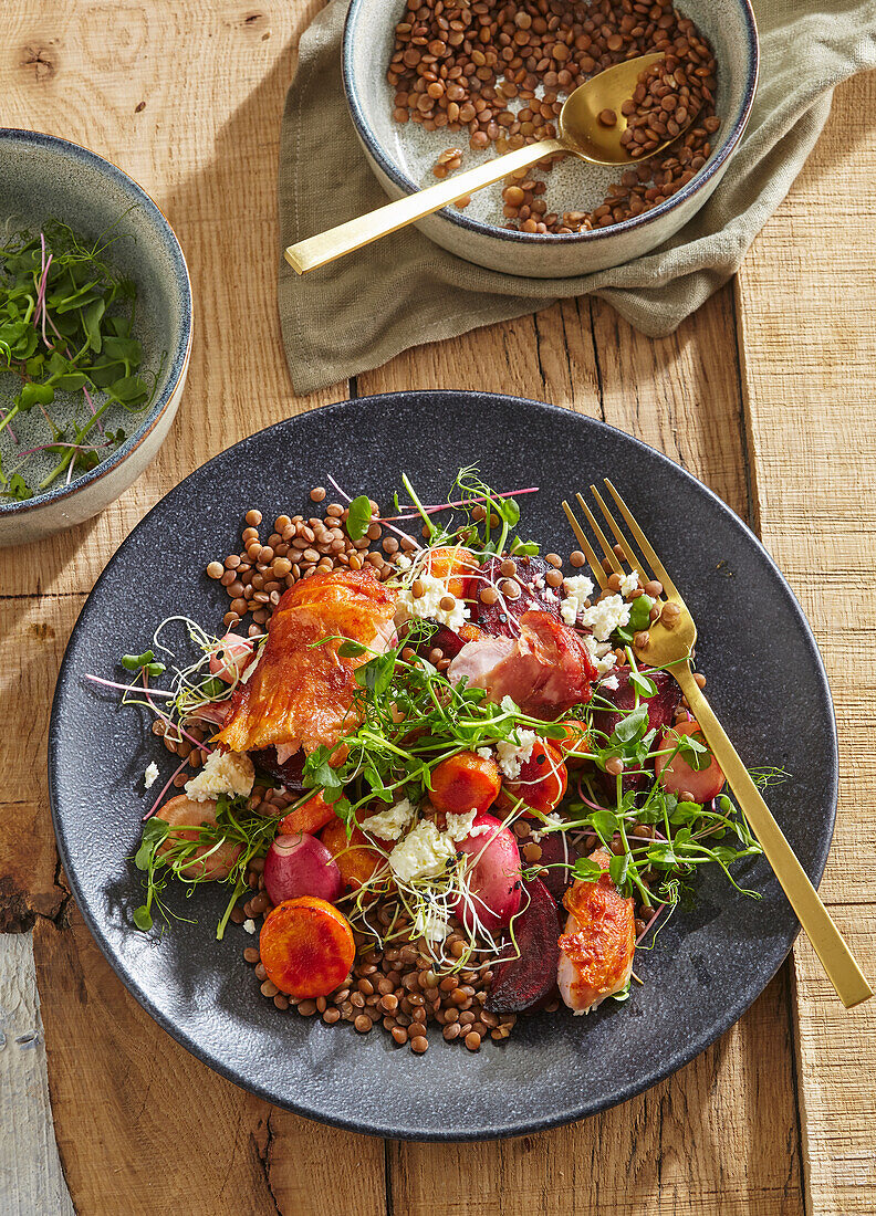 Lentil salad with roasted vegetables and smoked chicken