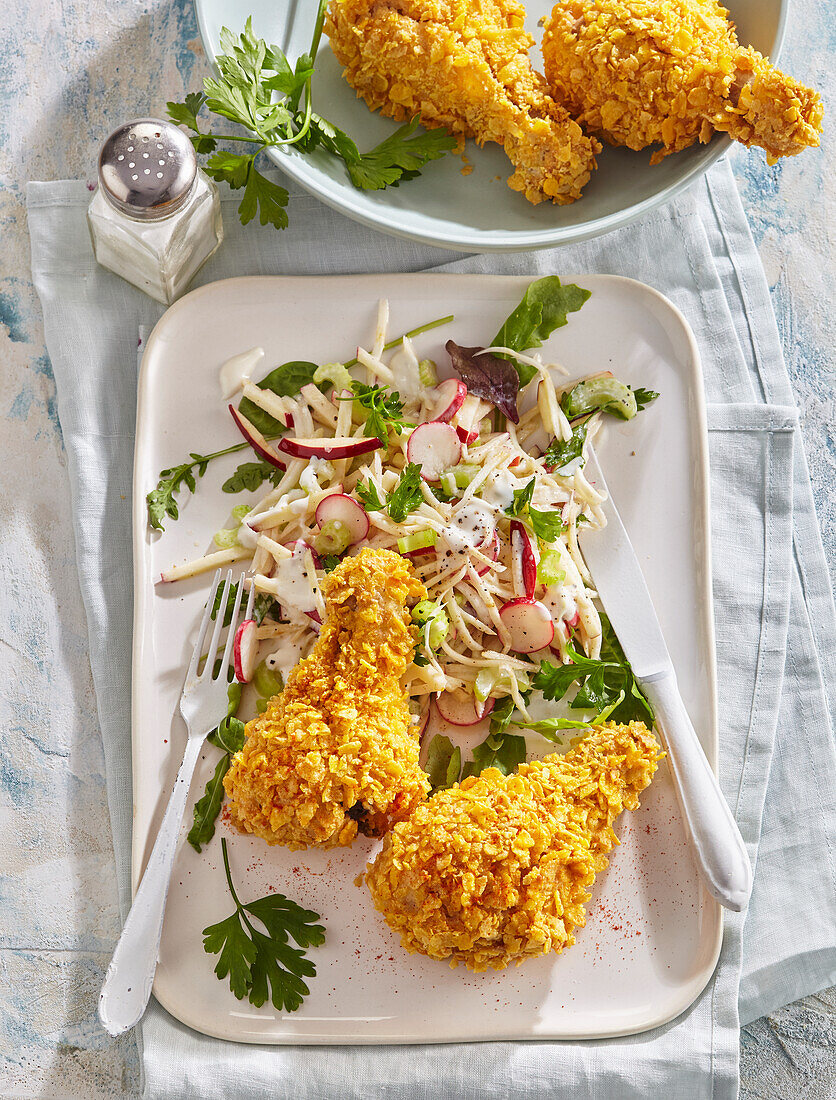 Crispy cornflake chicken drumsticks with coleslaw