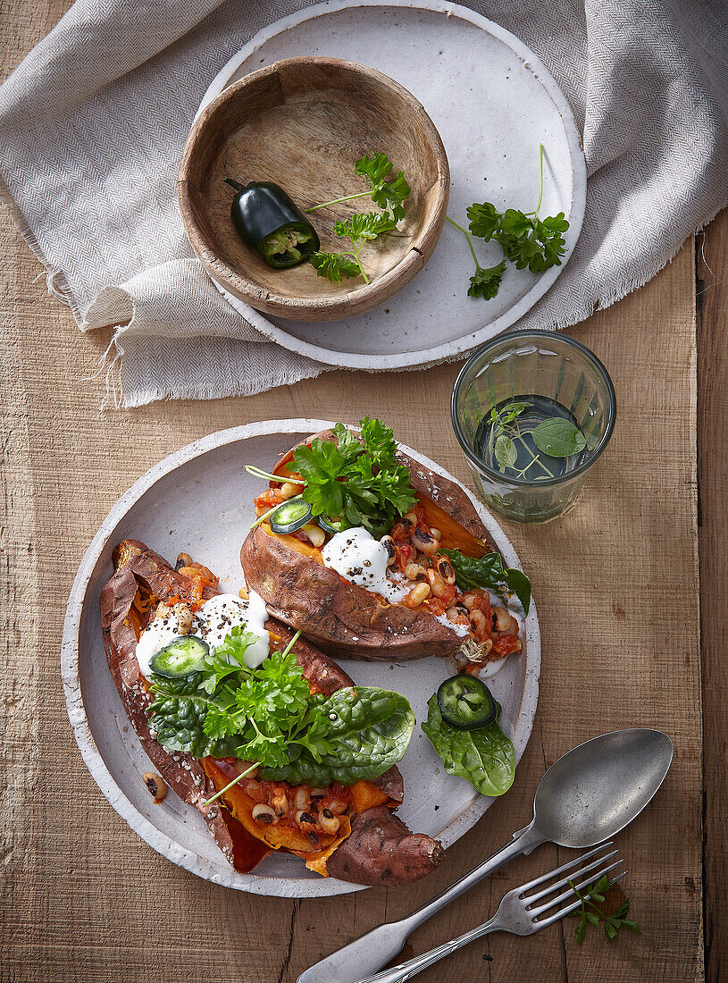 Baked sweet potatoes stuffed with beans