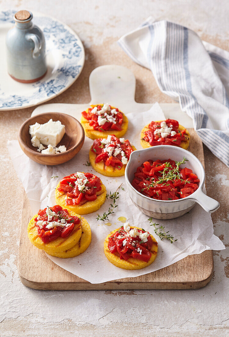 Polenta bites with roasted red peppers and feta