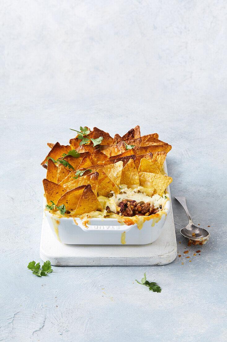 Mexican cottage pie with minced meat and tortilla chips