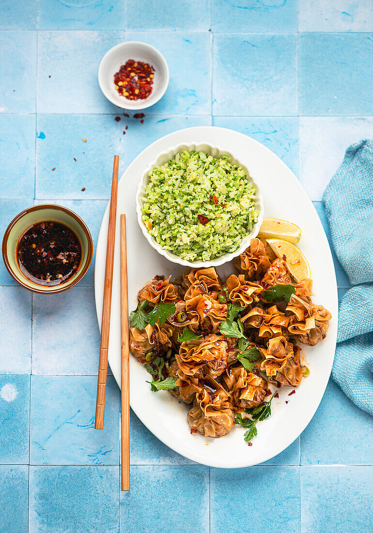 Chinese dumplings with broccoli rice