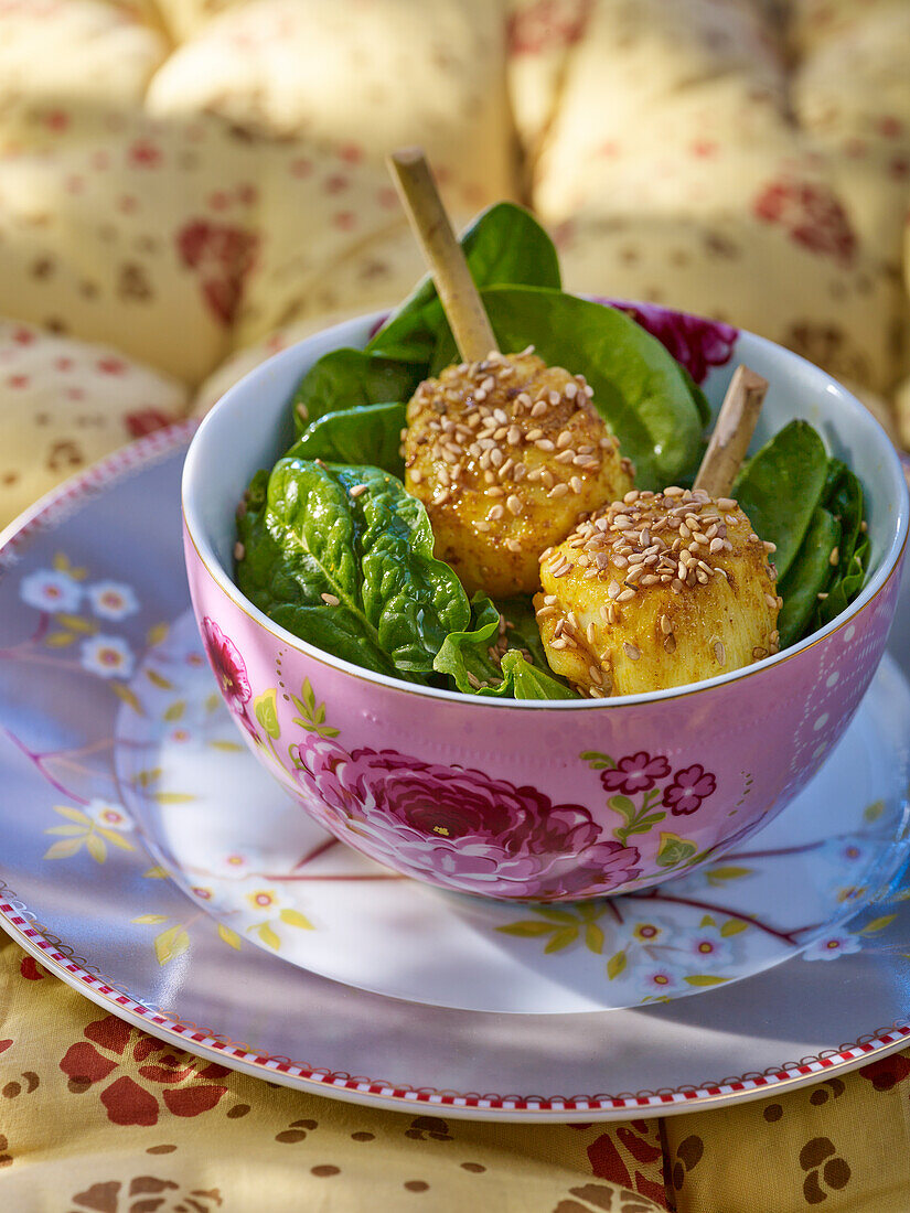Scallop skewers with spinach