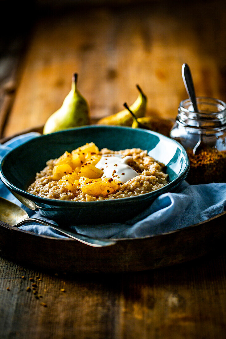 Honey porridge with pear ragout, yogurt and flower pollen