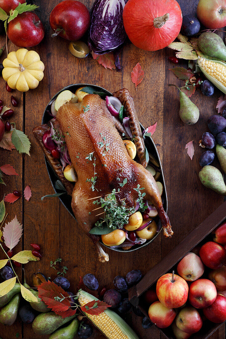 Roast goose with autumn vegetables and fruit