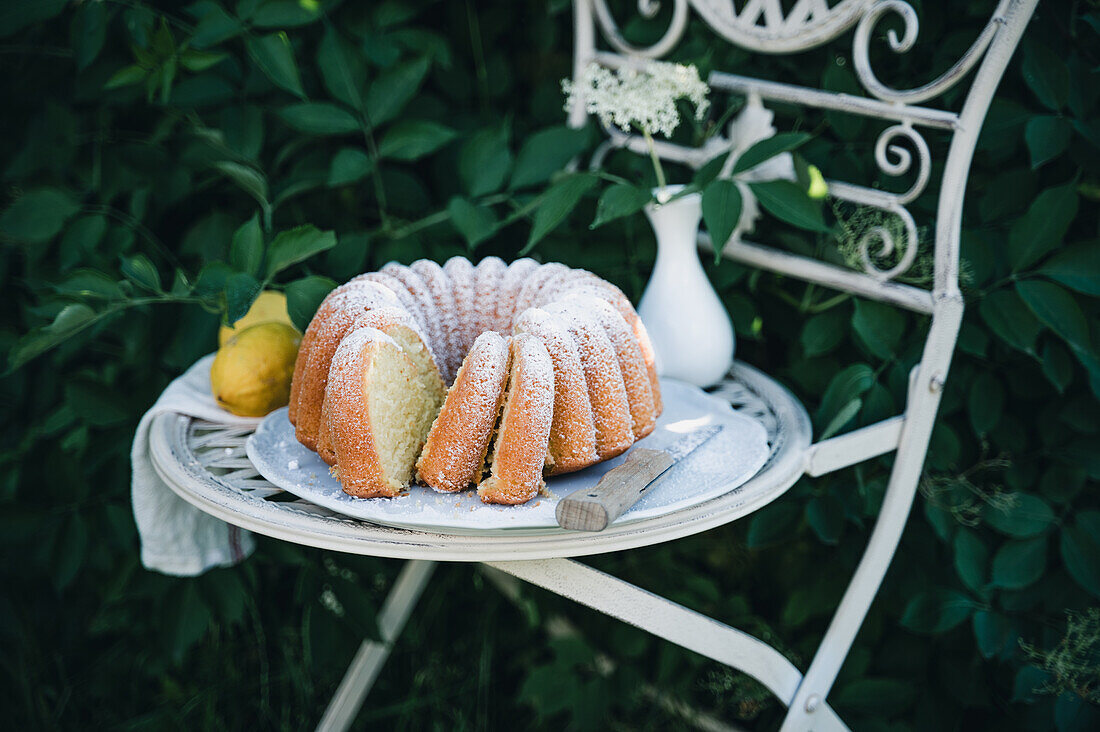 Vegan elderflower bundt cake with icing sugar