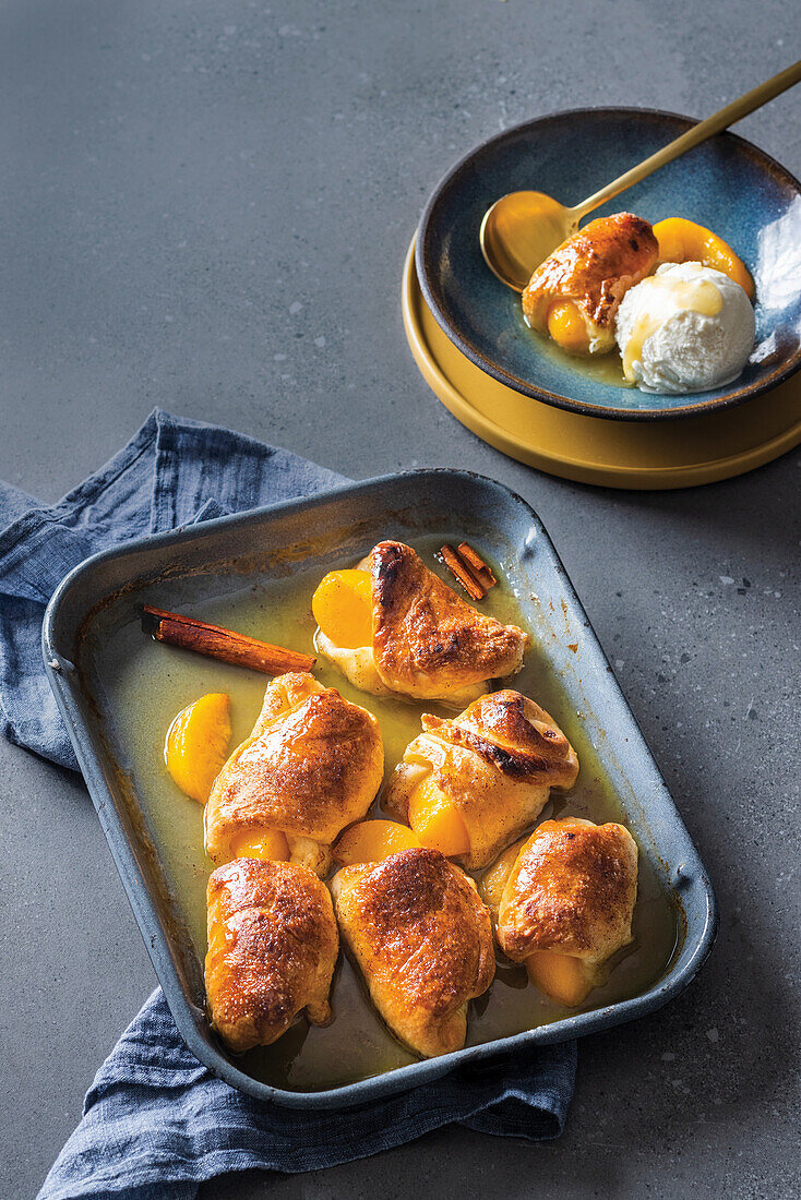 Baked peach croissants with ginger beer sauce and cinnamon