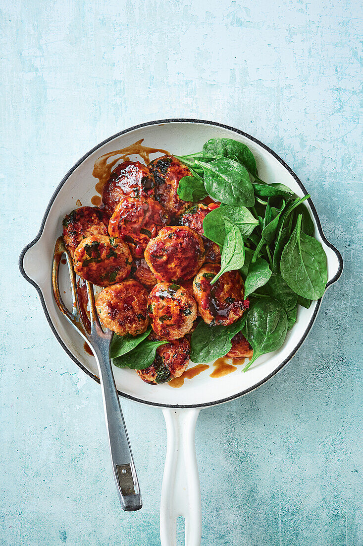 Hoisin glazed turkey and sweet potato meatballs with spinach