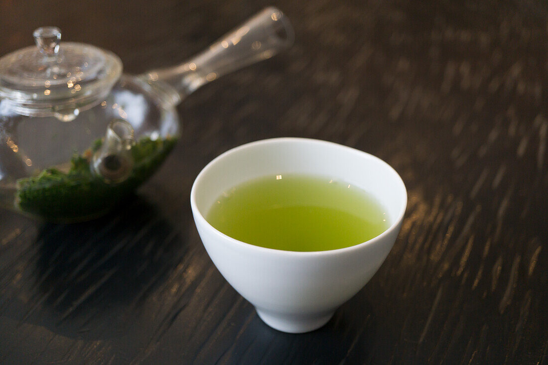 Green tea with sakura blossoms in a tea bowl (for the cherry blossom festival, Japan)