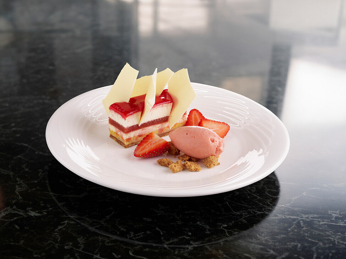 Strawberry dessert slice with strawberry sorbet