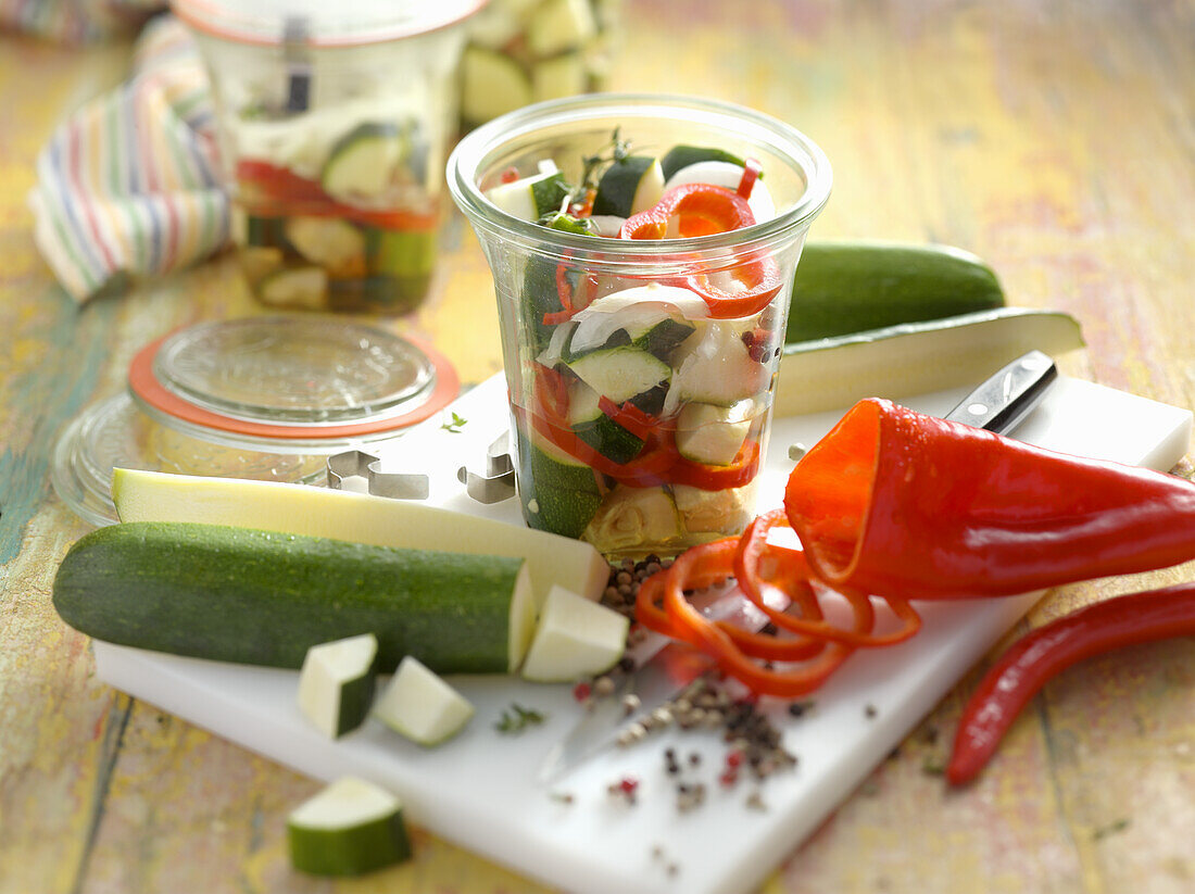 Preserved courgettes with pointed peppers