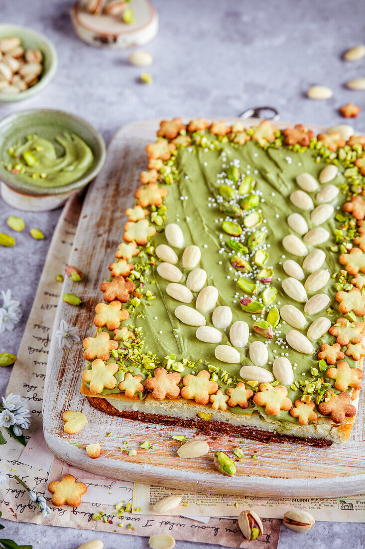 Easter cake with pistachio cream and almonds