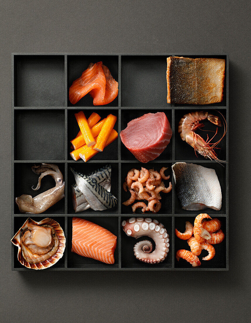Tray with fish and seafood for sushi