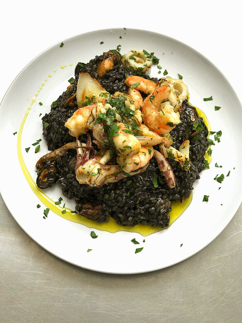 Black squid and seafood risotto