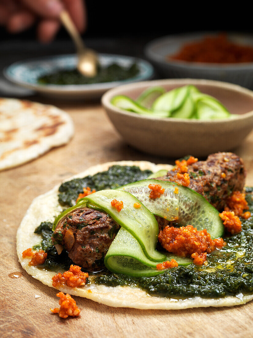 Wrap with duck sausage, cucumber and ajvar