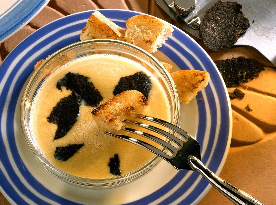 Fonduta with truffles (dipping bread in cheese & truffle sauce)