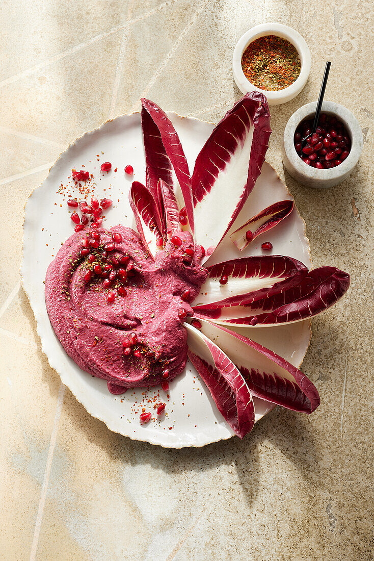 Beetroot hummus with almond butter and goat's cream cheese