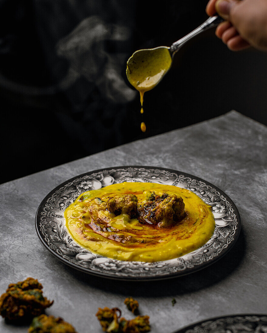 Indian pakoda doughnuts with kadhi