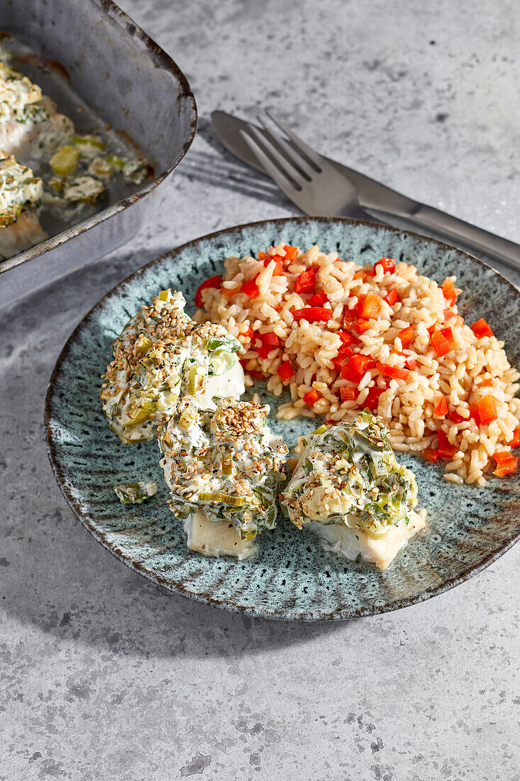 Gratinated cod fillet with pepper rice
