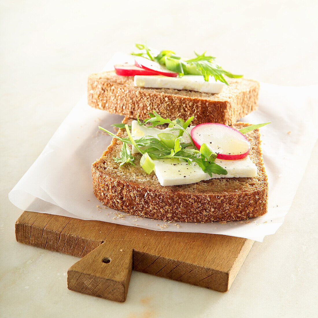 Bran bread with cheese and radishes